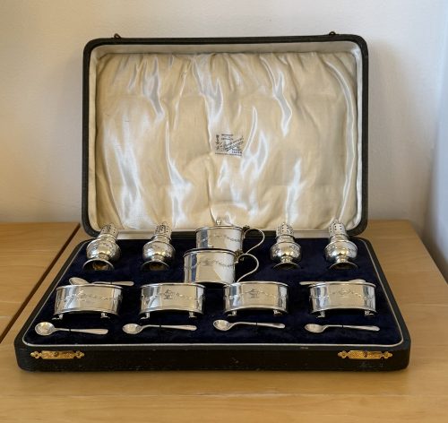 Unusual 16 piece silver cruet set Birmingham 1929