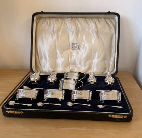Unusual 16 piece silver cruet set Birmingham 1929