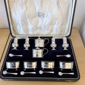 Unusual 16 piece silver cruet set Birmingham 1929