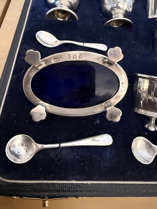 Unusual 16 piece silver cruet set Birmingham 1929