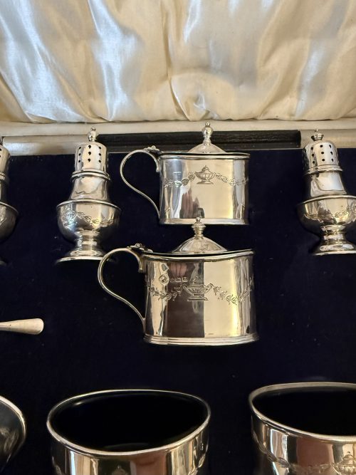 Unusual 16 piece silver cruet set Birmingham 1929