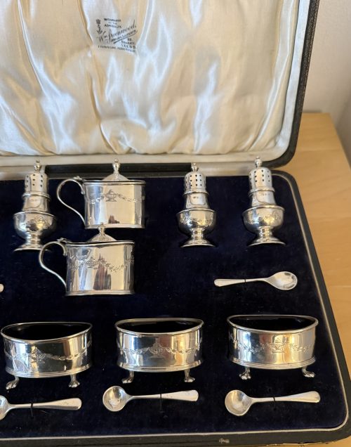 Unusual 16 piece silver cruet set Birmingham 1929