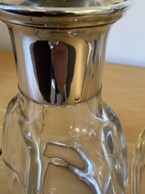 Fabulous pair of French Art Deco silver necked crystal decanters c-1910